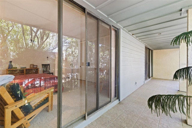 balcony featuring a sunroom