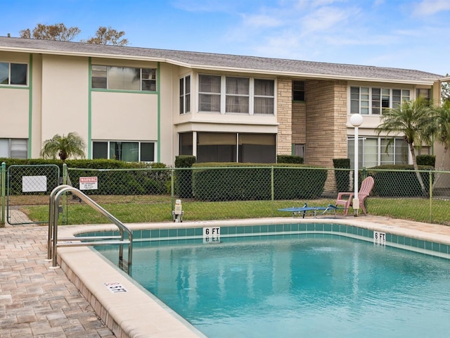 pool featuring fence