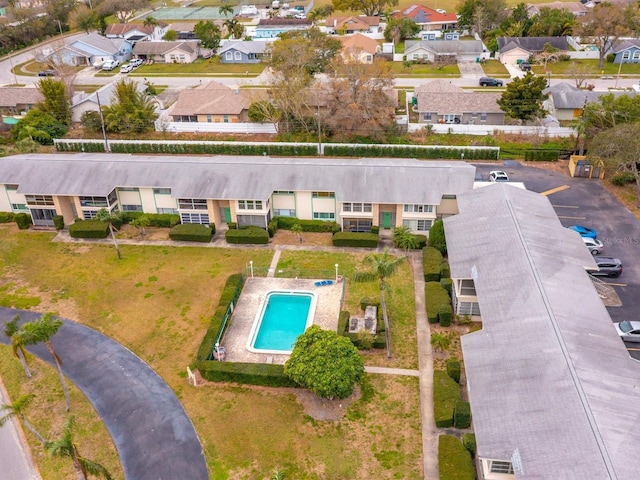 birds eye view of property with a residential view