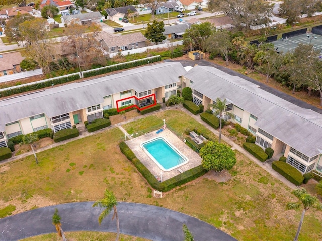 birds eye view of property with a residential view