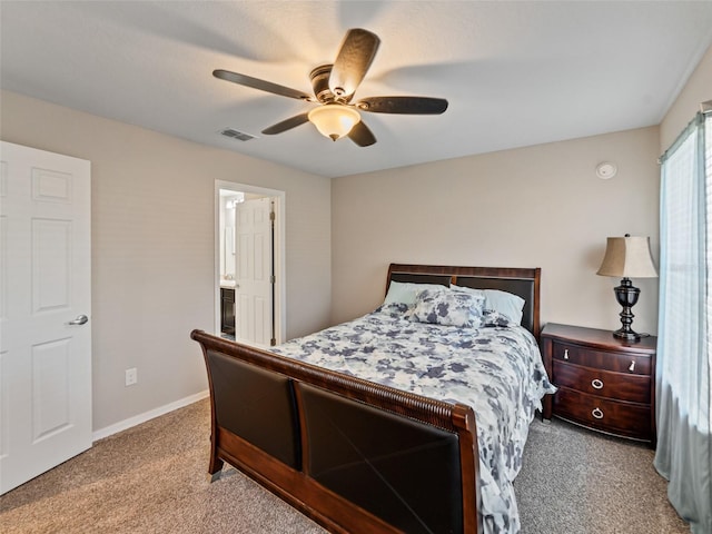 bedroom with carpet, visible vents, ceiling fan, and baseboards