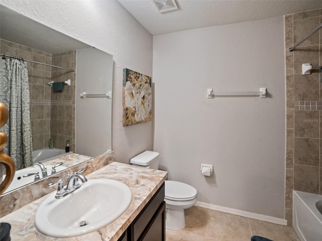 full bath featuring a textured ceiling, toilet, vanity, visible vents, and baseboards