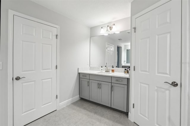13176 Twin Bridges Dr, Riverview, FL 33579 - bathroom with vanity, baseboards, and tile patterned floors