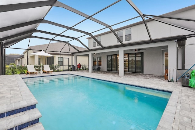 13176 Twin Bridges Dr, Riverview, FL 33579 - swimming pool featuring a ceiling fan, a patio area, and glass enclosure