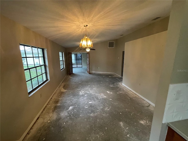 unfurnished dining area with visible vents and baseboards