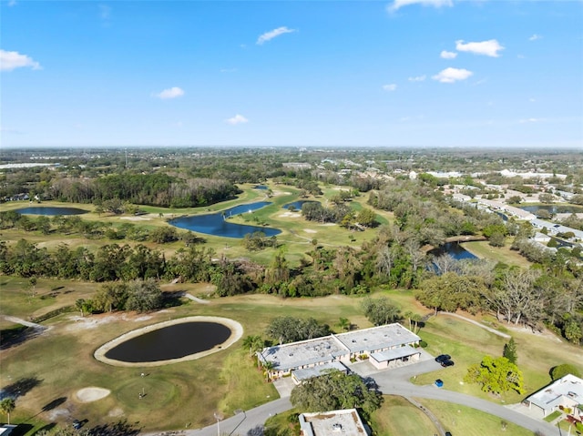 aerial view with a water view and golf course view