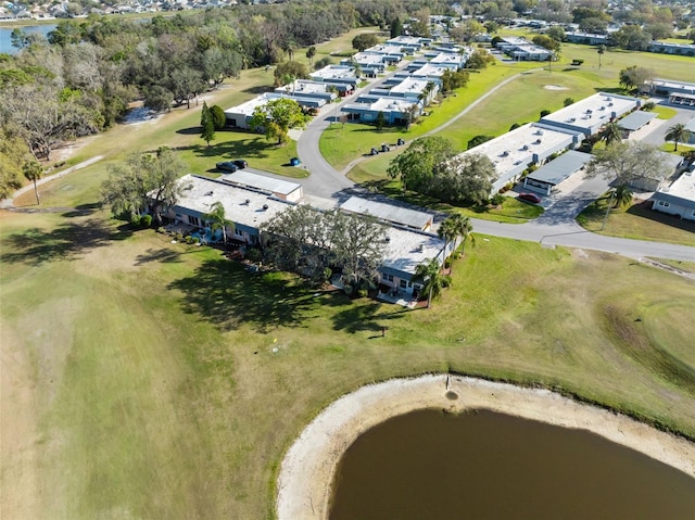 drone / aerial view featuring a residential view and a water view