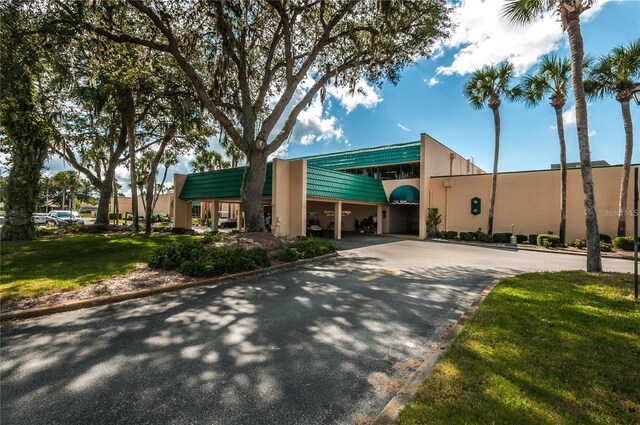 view of property featuring driveway