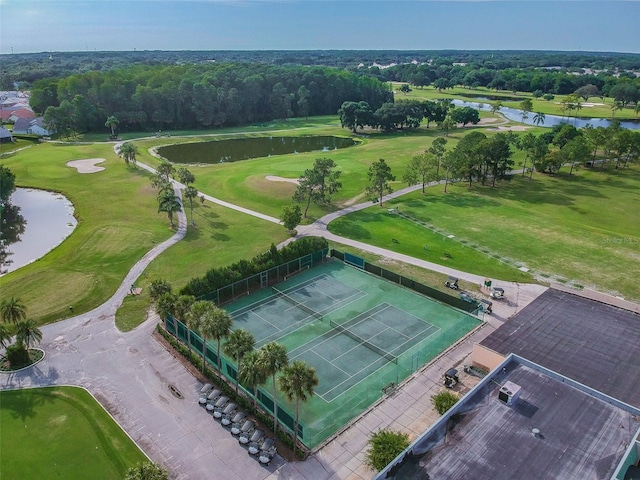 bird's eye view with a water view and golf course view