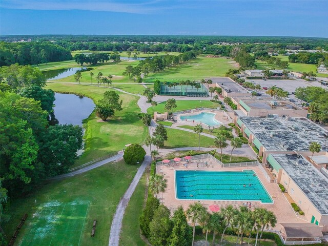 aerial view with a water view and golf course view