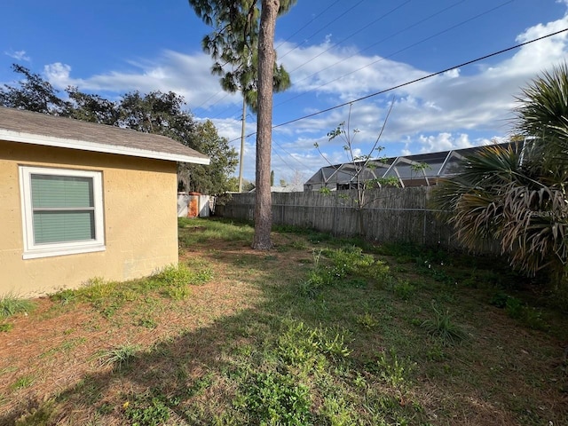 view of yard with fence