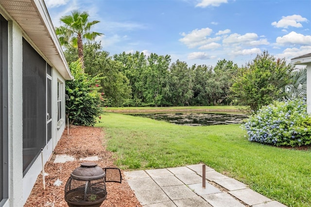29312 Marker Loop, San Antonio, FL 33576 - view of green lawn with a patio