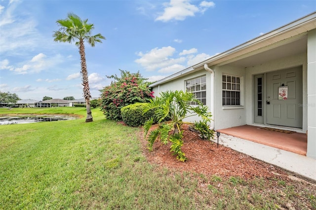 29312 Marker Loop, San Antonio, FL 33576 - view of green lawn with a water view