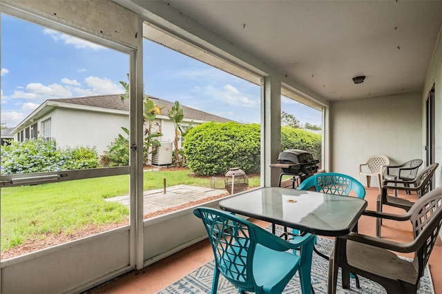 29312 Marker Loop, San Antonio, FL 33576 - sunroom / solarium with outdoor dining space