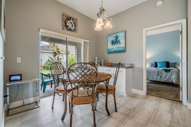 29312 Marker Loop, San Antonio, FL 33576 - dining room with baseboards and a chandelier