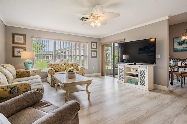 29312 Marker Loop, San Antonio, FL 33576 - living room featuring ornamental molding, a ceiling fan, and light wood finished floors