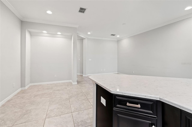 kitchen with recessed lighting, visible vents, dark cabinets, and ornamental molding