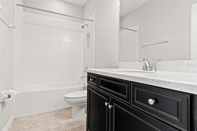 bathroom featuring tile patterned floors, vanity, toilet, and bathing tub / shower combination