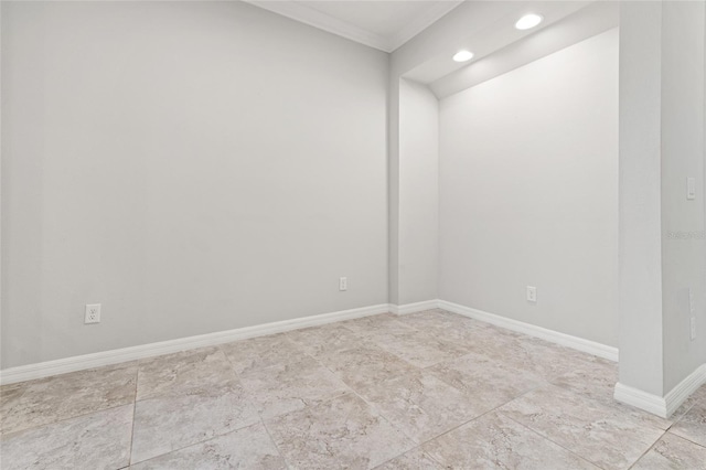 spare room with recessed lighting, baseboards, and ornamental molding