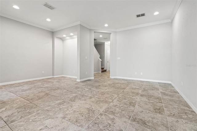 below grade area with ornamental molding, recessed lighting, visible vents, and baseboards