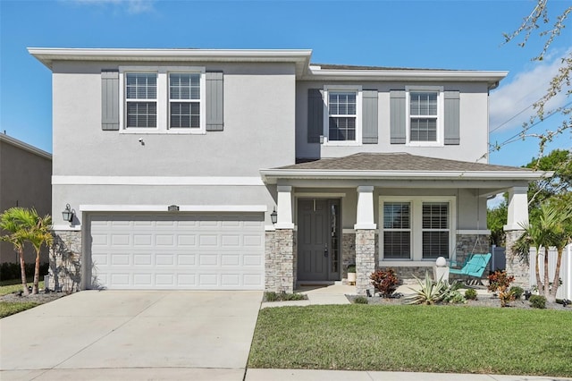 view of front of house with a porch, an attached garage, stone siding, and stucco siding