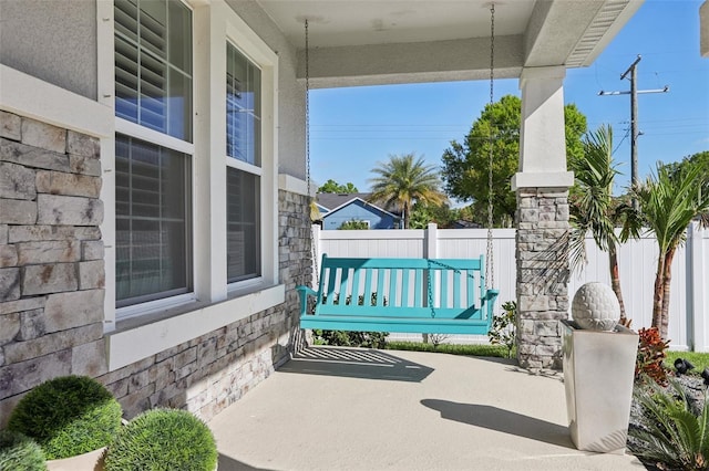 view of patio / terrace with fence