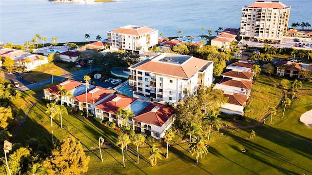 aerial view with a water view and a residential view