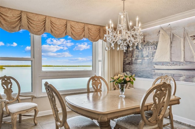 634 Edgewater Dr Unit 744, Dunedin, FL 34698 - dining room with a textured ceiling and a chandelier