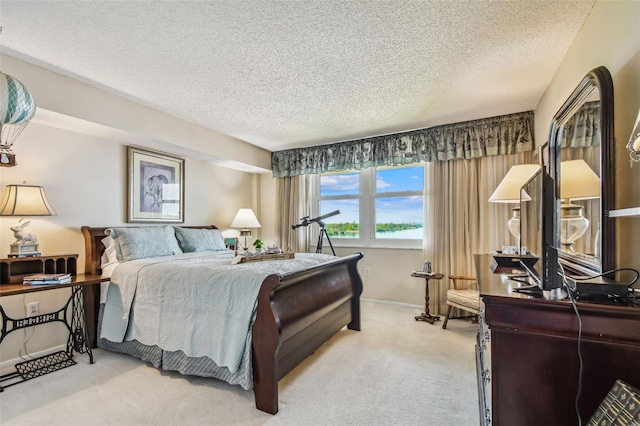 634 Edgewater Dr Unit 744, Dunedin, FL 34698 - carpeted bedroom featuring a textured ceiling