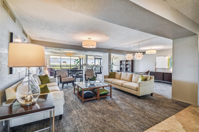 634 Edgewater Dr Unit 744, Dunedin, FL 34698 - living room with a textured ceiling