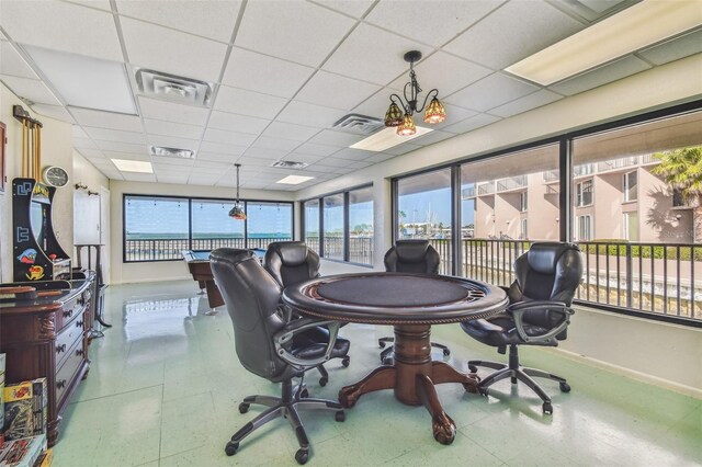 634 Edgewater Dr Unit 744, Dunedin, FL 34698 - office space with tile patterned floors and a drop ceiling