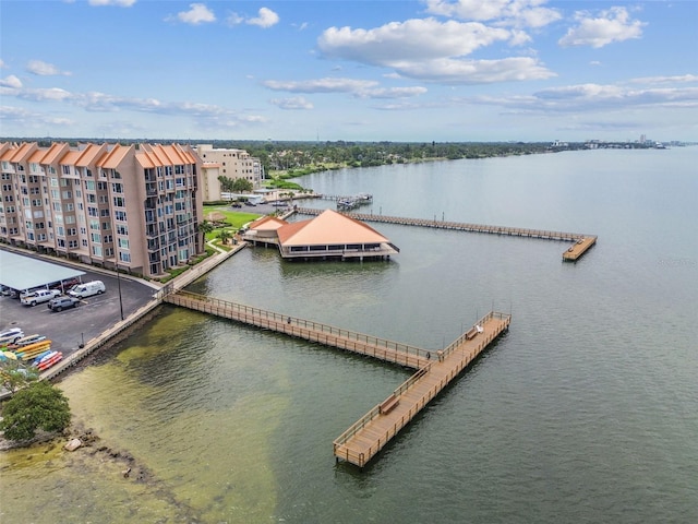 634 Edgewater Dr Unit 744, Dunedin, FL 34698 - drone / aerial view of a nearby body of water and apartment complex / building