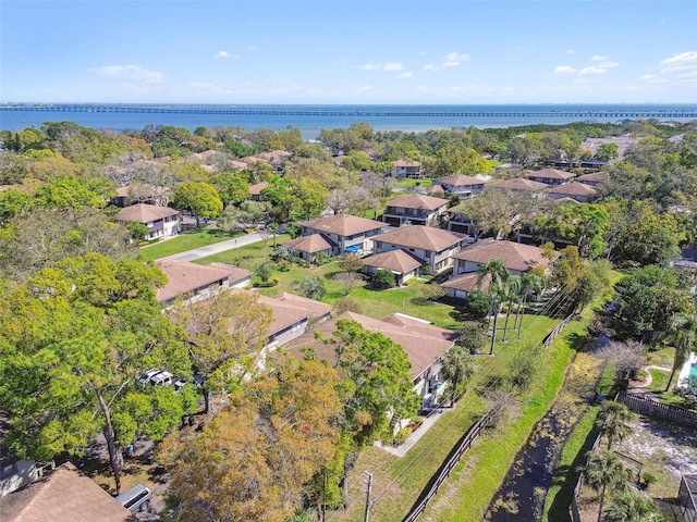 aerial view with a water view and a residential view