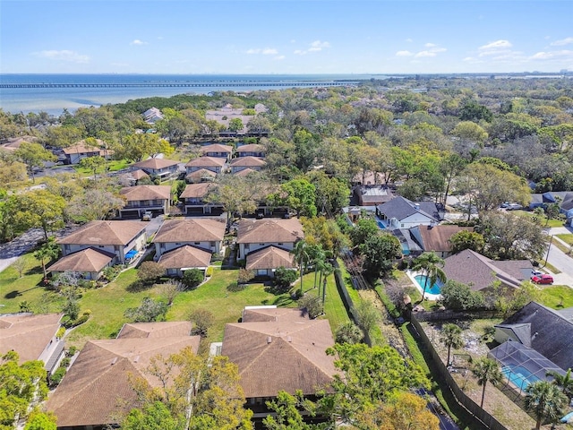 bird's eye view with a water view and a residential view