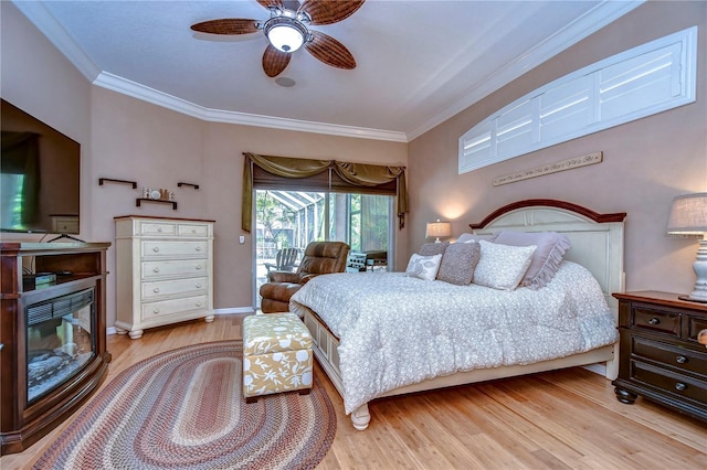 bedroom featuring access to outside, crown molding, light wood finished floors, and ceiling fan