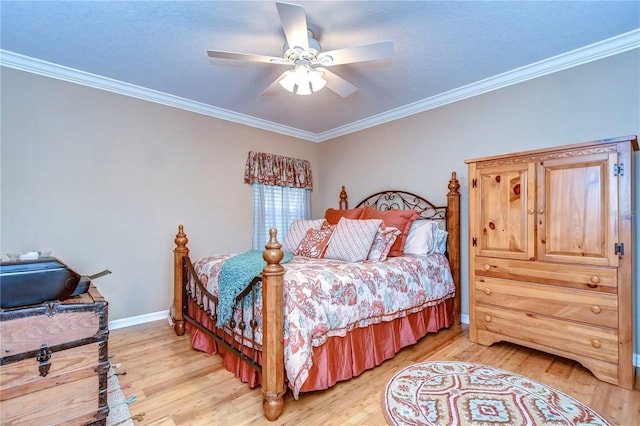 bedroom with light wood finished floors and ornamental molding