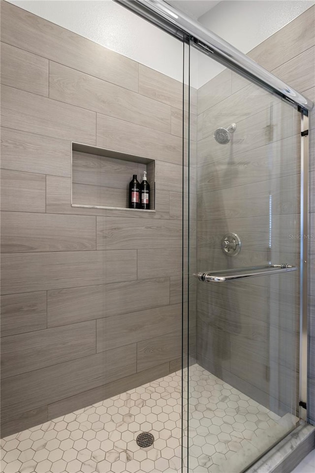 full bath featuring a stall shower