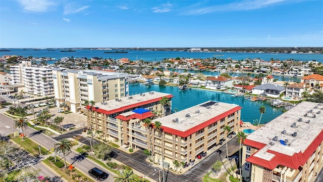 birds eye view of property featuring a water view