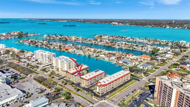 drone / aerial view with a water view and a view of city