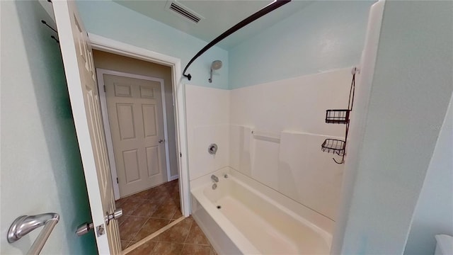 full bathroom featuring visible vents, shower / tub combination, and tile patterned floors