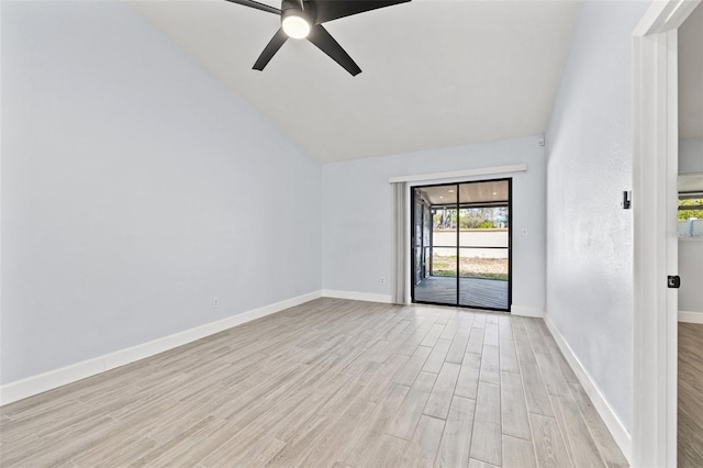 unfurnished room with light wood-type flooring, lofted ceiling, baseboards, and ceiling fan