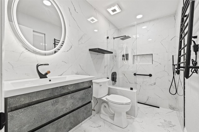 full bathroom with vanity, stone wall, a marble finish shower, toilet, and marble finish floor