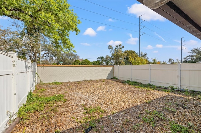 view of yard featuring a fenced backyard