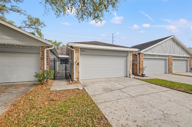 ranch-style house with a gate and brick siding