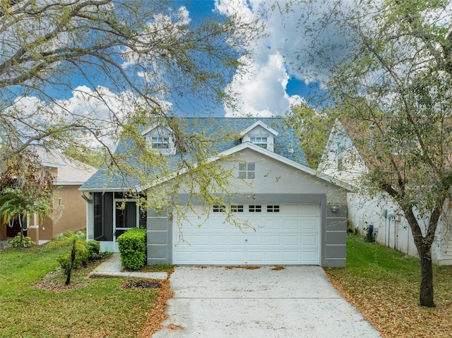 view of front of property featuring a garage, a front yard, and concrete driveway