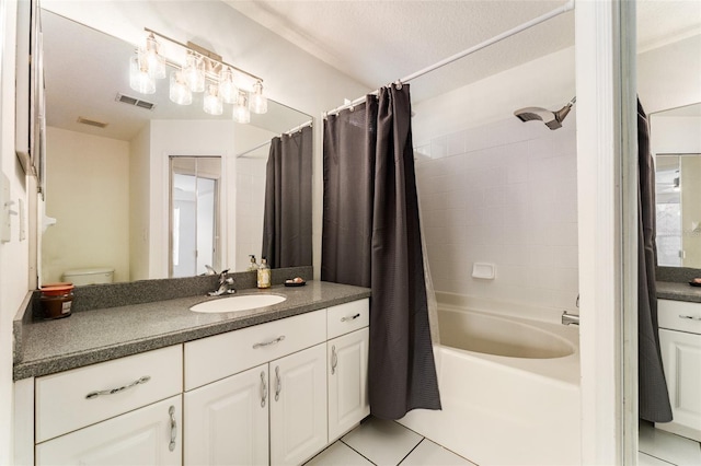 bathroom with shower / bathtub combination with curtain, tile patterned flooring, visible vents, and vanity