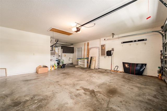 garage featuring a garage door opener and electric panel