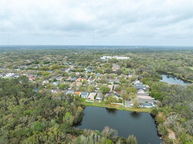 bird's eye view featuring a water view and a residential view