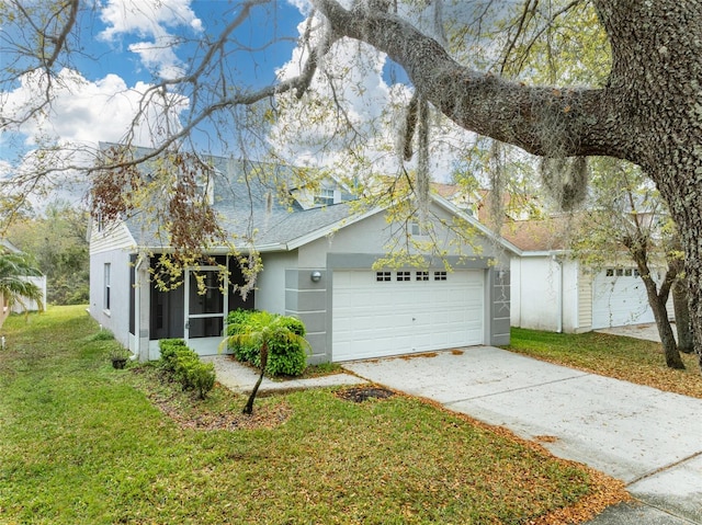 view of front of home featuring roof with shingles, stucco siding, concrete driveway, a front yard, and a garage