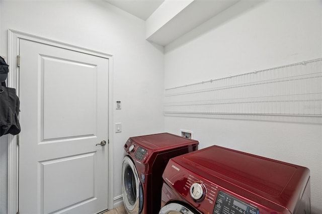 laundry room featuring laundry area and washing machine and dryer